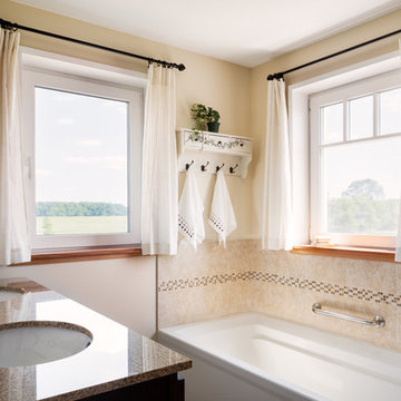 Bright and airy bathroom also includes a walk-in shower