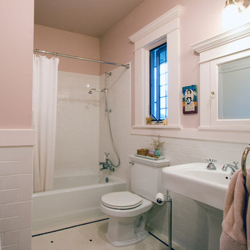 A bathroom taken down to the studs with a finished product that looks like it wa