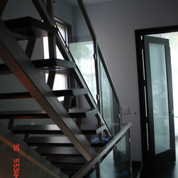 Steel stairs with glass panel - Products