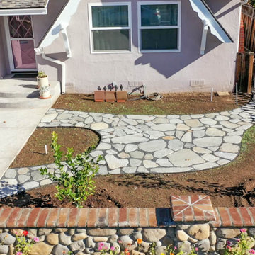 Front Yard Transformation (Cobblestone Fence, Grass, Idaho Quartzite Slabs)