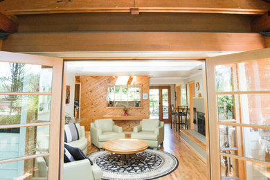 Mid-sized transitional beige two-story wood exterior home photo in Seattle
