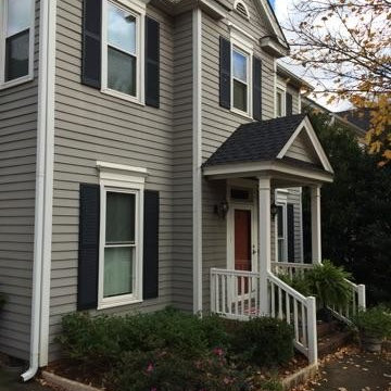 Charlotte, NC, upscale vinyl siding replacement by Belk Builders.