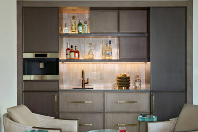Example of a trendy home bar design in Boston