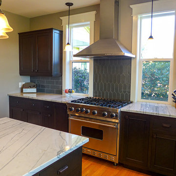 Tall kitchen windows bring in natural light