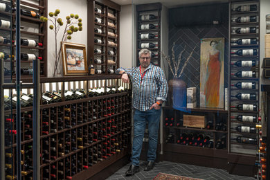 Wine cellar - mid-sized eclectic slate floor and gray floor wine cellar idea in Indianapolis with storage racks