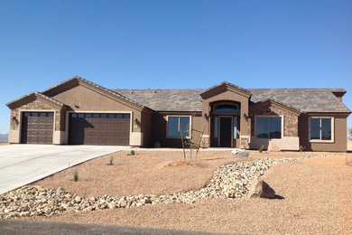 Craftsman one-story stucco exterior home idea in Las Vegas