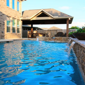 Patio Cover and Pool with Spa and Fire Feature in Long Meadow Farms, Richmond TX