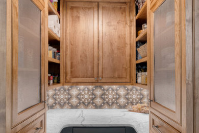 Example of a small country u-shaped slate floor and multicolored floor kitchen pantry design in Atlanta with beaded inset cabinets, medium tone wood cabinets, marble countertops, brown backsplash, ceramic backsplash and white countertops