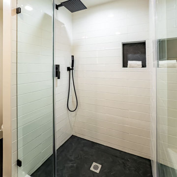 Frameless Glass Shower with Rain Head and Slate Pan
