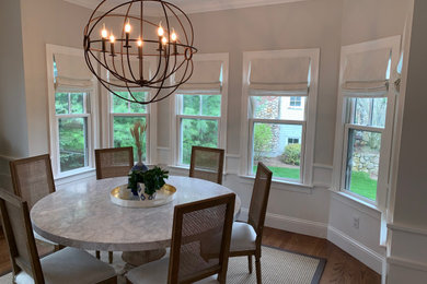 Example of a trendy dining room design in Boston