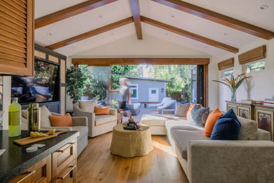 Living room - tropical living room idea in San Francisco