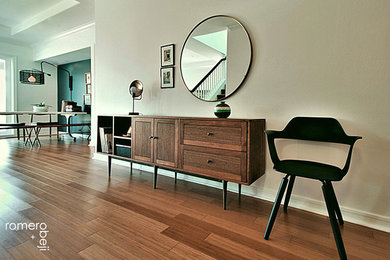 Foyer - mid-sized scandinavian brown floor foyer idea in Orange County with white walls