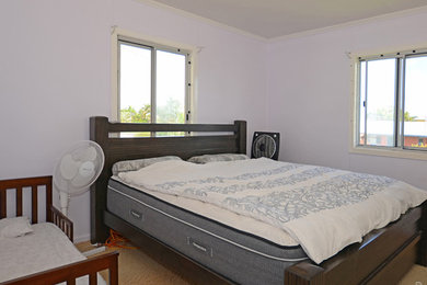 Exempel på ett eklektiskt sovrum