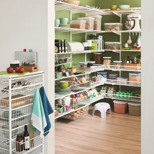Mid-sized traditional kitchen pantry photos - Example of a mid-sized classic l-shaped light wood floor kitchen pantry design in Other with no island, open cabinets and white cabinets