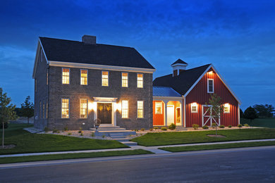 Mid-sized cottage two-story mixed siding exterior home photo in Other