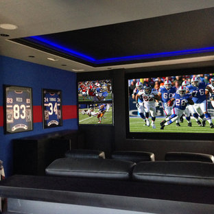 Design ideas for a large contemporary enclosed home cinema in New Orleans with a wall mounted tv and blue walls.