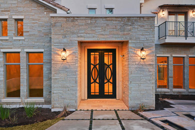Inspiration for a transitional exterior home remodel in Austin