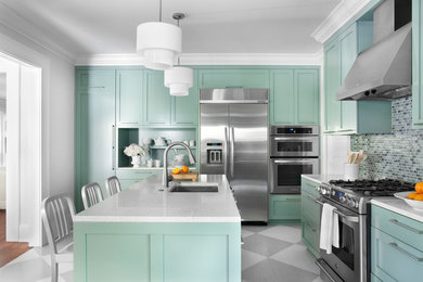 Example of a trendy multicolored floor kitchen design in Atlanta with stainless steel appliances and blue cabinets