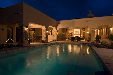 Tuscan home design photo in Albuquerque