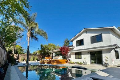 Example of a mid-sized trendy backyard l-shaped pool landscaping design in San Francisco