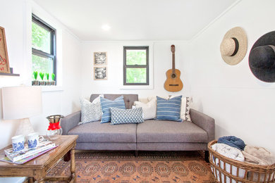 Example of a country home design design in Other