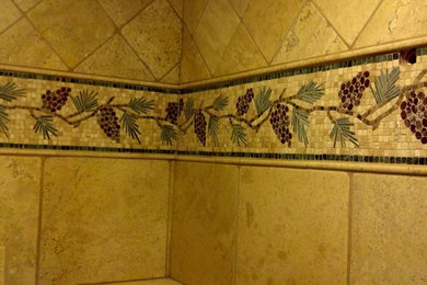Travertine shower with mosaic