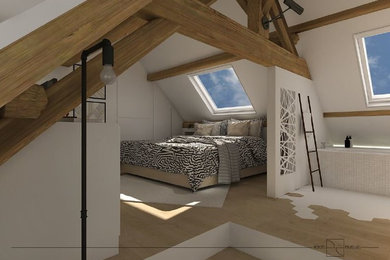 Idée de décoration pour une grande chambre mansardée ou avec mezzanine tradition avec un mur blanc et parquet clair.