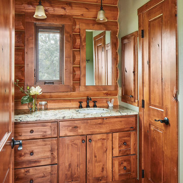 Iowa Milled Log Home Powder Room, A Cabin Refined™ Design