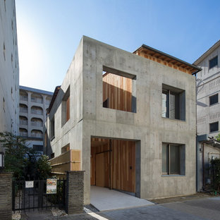 名古屋のモダンスタイルのおしゃれな家の外観 (コンクリートサイディング、寄棟屋根、戸建、金属屋根) の写真