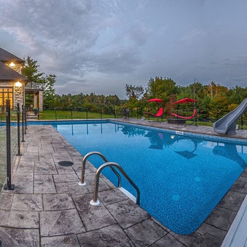 Hilltop multi level automated pool with lighted water features