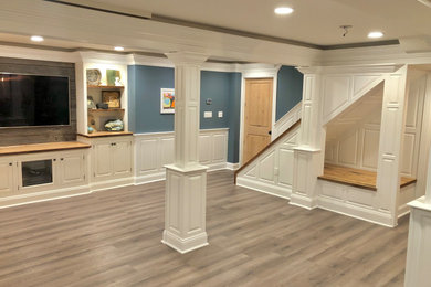 Example of an arts and crafts basement design in Philadelphia