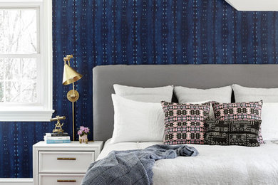 Transitional dark wood floor and brown floor bedroom photo in Philadelphia with blue walls