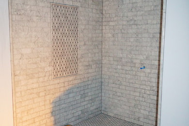 3 Showers, 4 floor tile variety, and 1 laminate floor.