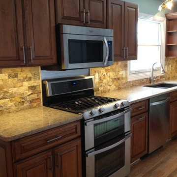 Kitchen with Scabas Stone Backsplash
