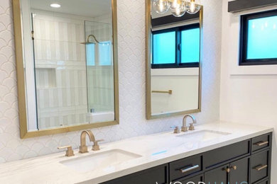 Mid-sized minimalist master white tile and porcelain tile porcelain tile, beige floor and double-sink bathroom photo in Miami with shaker cabinets, black cabinets, a two-piece toilet, white walls, an undermount sink, quartzite countertops, a hinged shower door, white countertops and a freestanding vanity