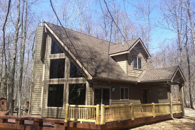 Home design - rustic home design idea in Other