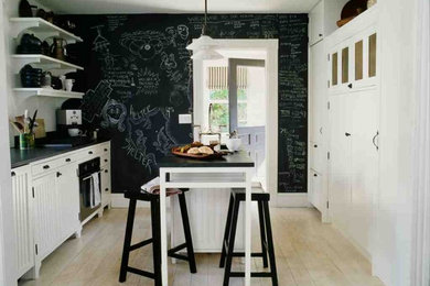 Inspiration for a beach style kitchen in New York with beige floor.