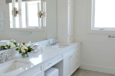 Example of a transitional bathroom design in Calgary