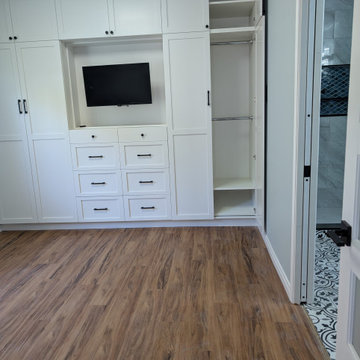 Custom Built-In Wardrobe and Media Wall in Transitional Bedroom