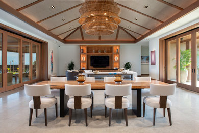 Example of an island style dining room design in Other