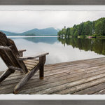 Marmont Hill Inc. - "Lone Chair" Framed Painting Print, 24"x16" - Weather worn and faded wood makes up the dock and comfortable looking wooden lounge chair, while the print gives a perfect view of a lake bordered by a pine forest. Like a window out to the perfect relaxation location. Proudly printed in the USA, this piece is printed on high quality archive paper and professionally hand-framed. With wall-mounting hooks included, this artful accent is ready to hang up as soon as it reaches your front door.