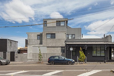 Photo of a contemporary home design in Melbourne.