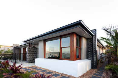 Inspiration for a transitional home design remodel in Miami