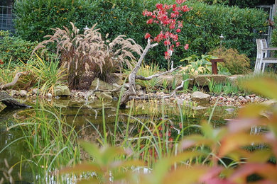 ハノーファーにある夏のトラディショナルスタイルのおしゃれな庭 (日向、天然石敷き) の写真