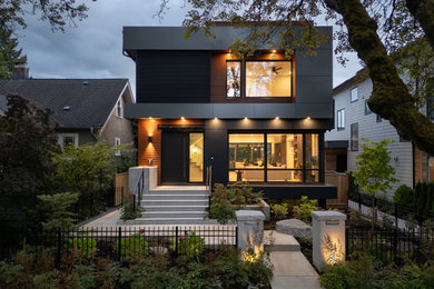 Example of a trendy multicolored two-story mixed siding exterior home design in Vancouver