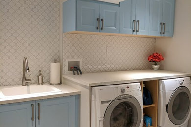 Inspiration for a transitional laundry room remodel in Toronto