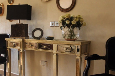 Inspiration for a large timeless marble floor entryway remodel in New York with a brown front door