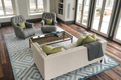 Example of a large minimalist enclosed dark wood floor living room design in Other with white walls