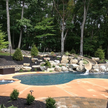 Stroud Township salt water pool with spa, sunshelf, slide, and waterfall
