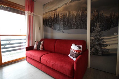 Living room - small modern laminate floor living room idea in Turin
